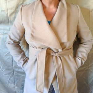 Beautiful wrap coat with pockets and belt.